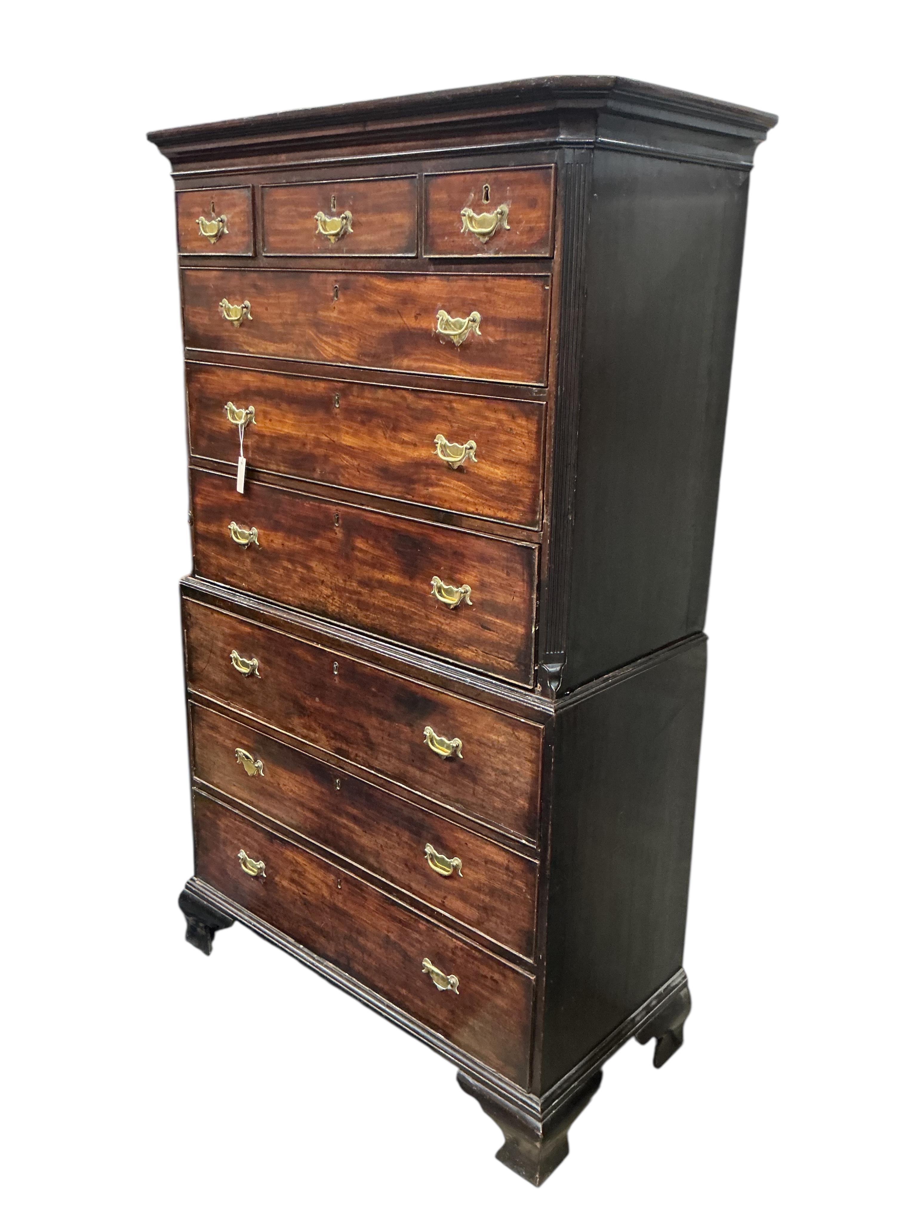 A George III mahogany chest on chest, width 112cm, depth 54cm, height 187cm